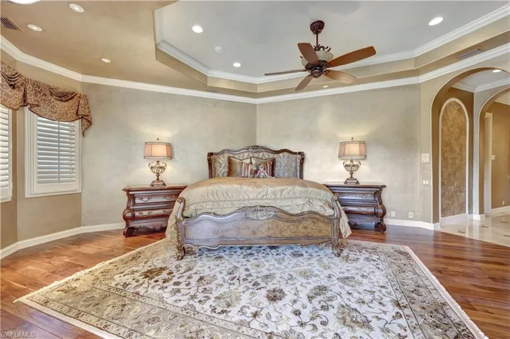 The primary suite is privately tucked away from the main living areas of the home.
