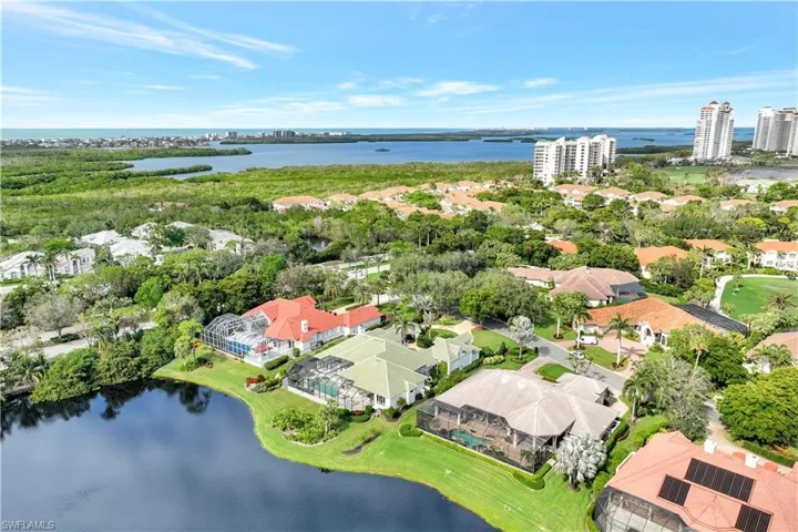 Fall in love with this one-of-a-kind residence in Deerwood of Bonita Bay!
