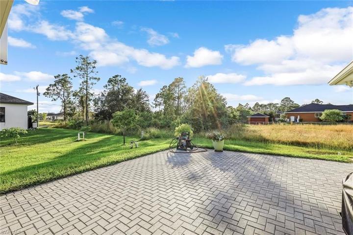 Large paver area for additional outdoor furniture.
