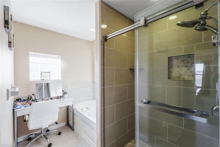 Jetted tub with seperate shower