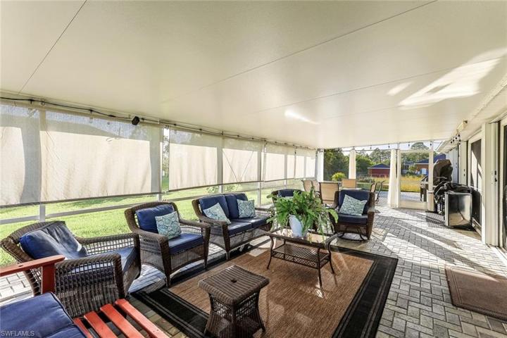 Either let the sunshine in on the cooler days or close the shades in the warmer days.