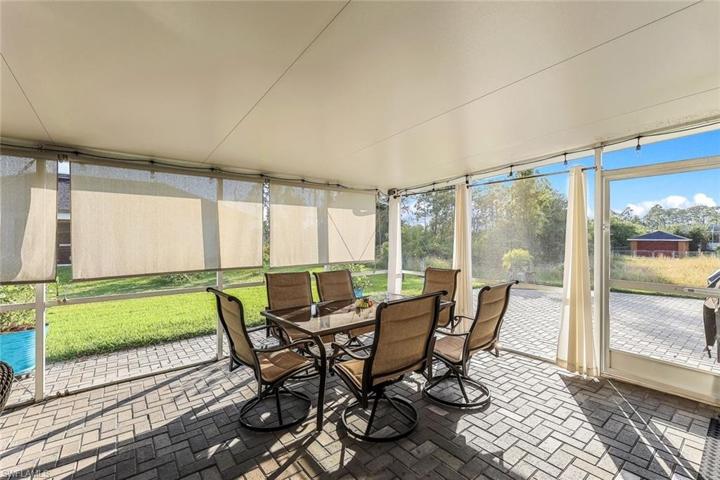Large 20 x 40 screened lanai with paver deck.