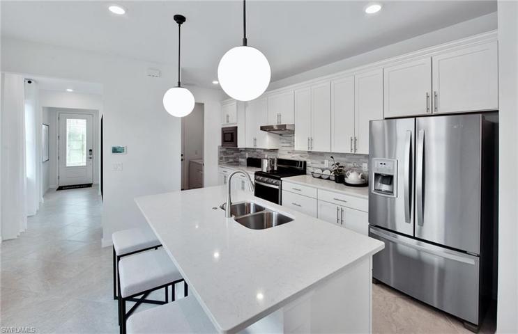 Photos are from a furnished model. Options for this home may vary