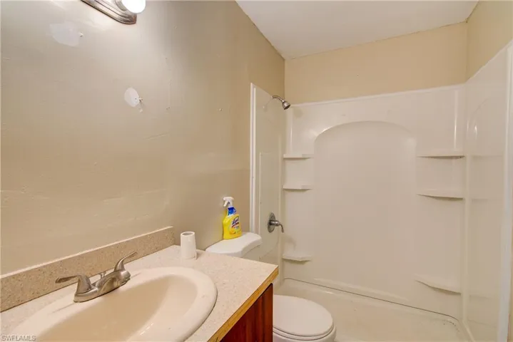 Bathroom featuring vanity and bathing tub / shower combination