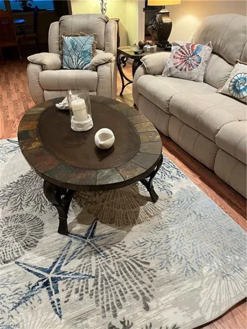 Wood-finish flooring provides a warm foundation for the room