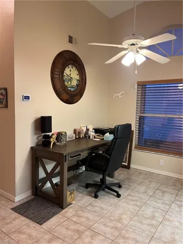 Vaulted ceiling with an integrated ceiling fan and lighting fixture