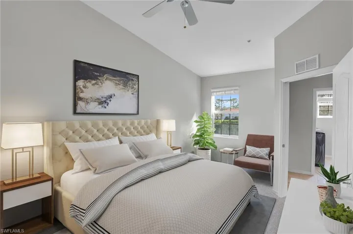 Carpeted bedroom with ceiling fan