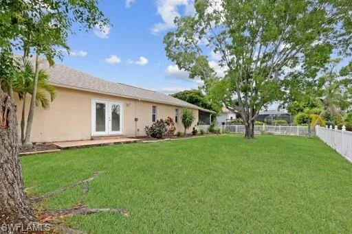 View of yard with french doors