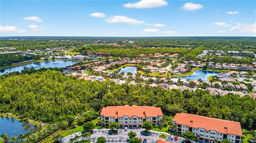 Aerial view of residential area with a large body of water
