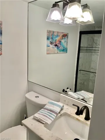 Bathroom with vanity and toilet