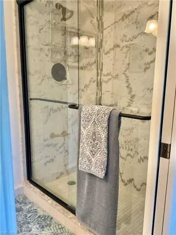 Bathroom featuring an enclosed shower