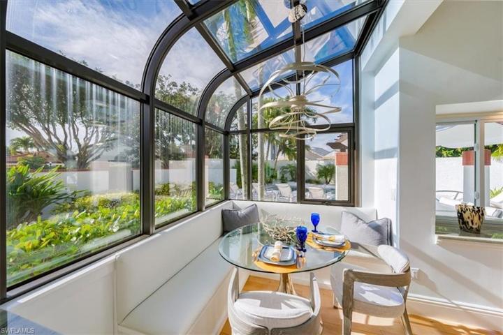 Dining banquette in conservatory kitchen