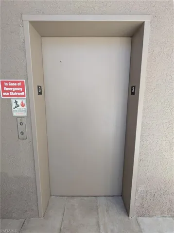 Property entrance with elevator.