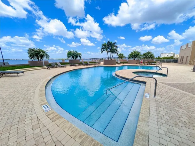 Community pool with a patio area