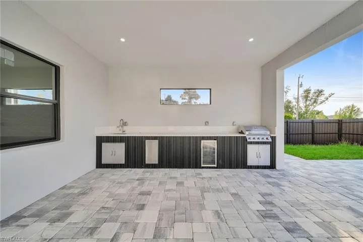 View of patio / terrace with grilling area and sink