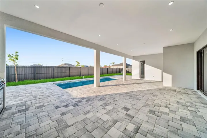 View of pool with a patio area