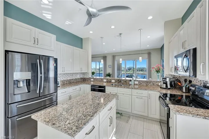 stainless Samsung appliances in oversized chef's kitchen with cabinet pullouts. 2018 construction!