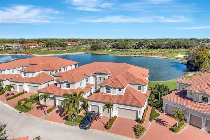 Middle building in center of photo, at pie-shaped angle from neighboring building for privacy!  Awesome panoramic views of lake and golf course.