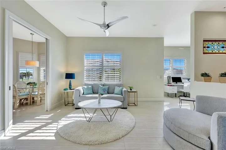 This home is super light and bright with light wood plank TILE throughout!