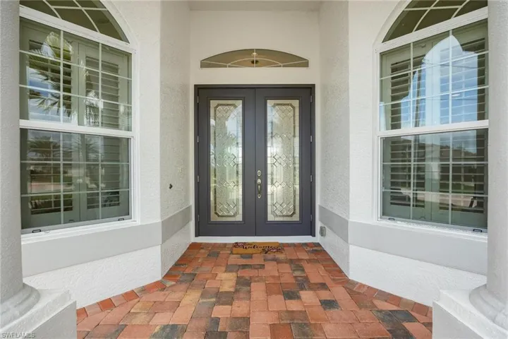 Property entrance with french doors
