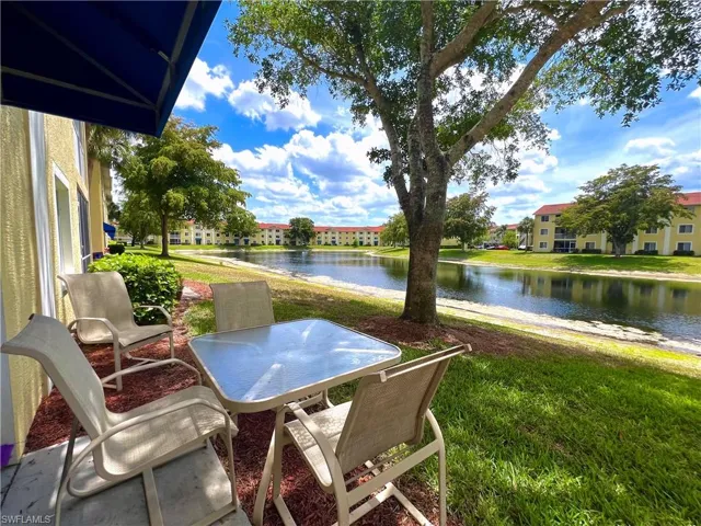 View of terrace featuring a water view