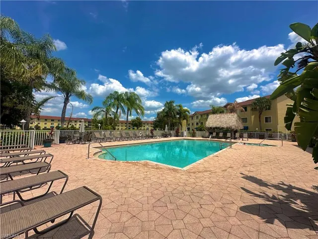 View of swimming pool with a patio area