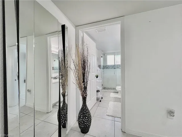 Bathroom with tile flooring and toilet