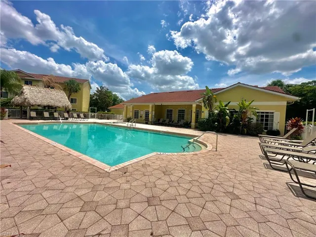 View of swimming pool with a patio area