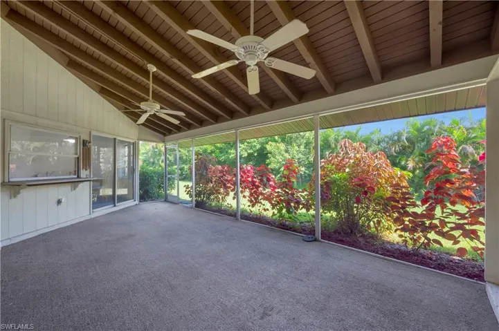 Vaulted Ceiling with Wood Beams.