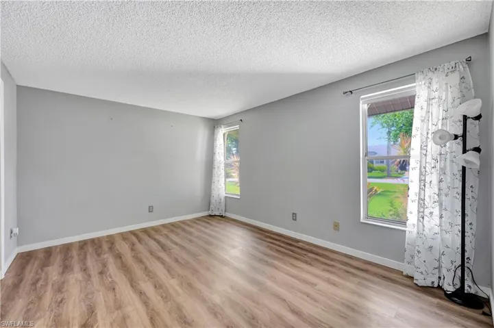 Guest Bedroom 1 with LVP flooring