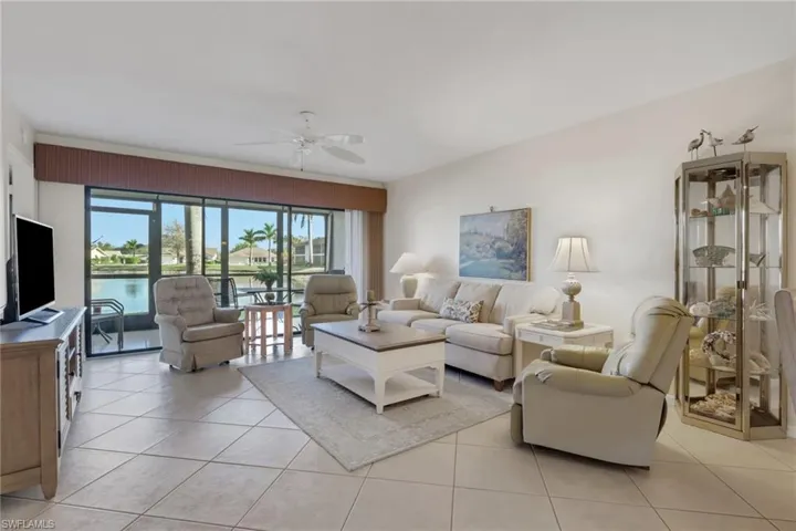 Living area featuring a lake view