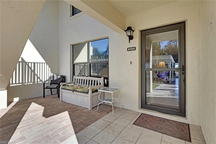 View of exterior entry and spacious patio