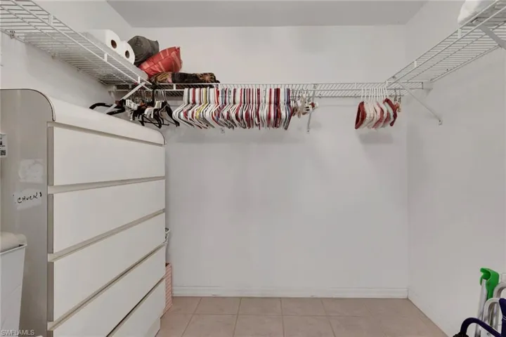 Spacious walk-in closet in the primary bedroom