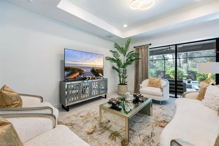 Spacious great room with open concept to kitchen and access to amazing outdoor space
