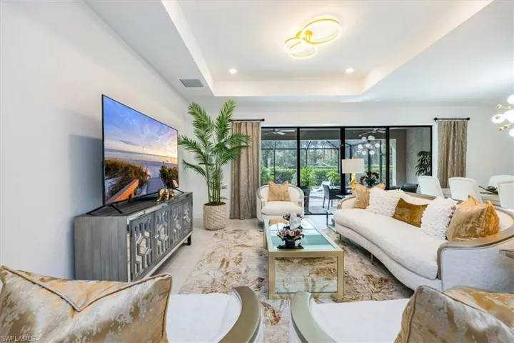 Spacious great room with open concept to kitchen and access to amazing outdoor space