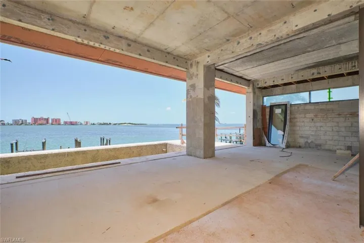 View of patio / terrace with a water view