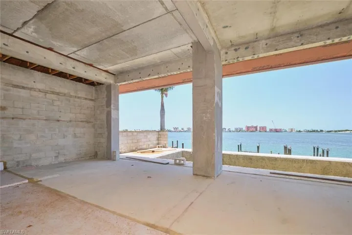 View of patio with a water view