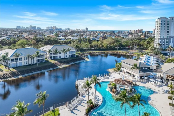 Drone / aerial view of a large body of water and city skyline