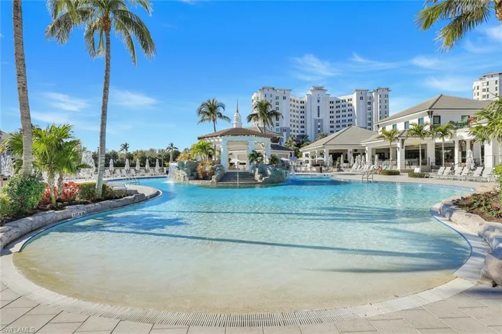 Community pool featuring a patio area