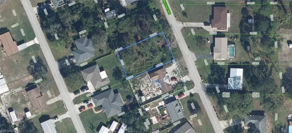 Aerial Survey. Presenting an overhead depiction of the property with surrounding parcels and street grid