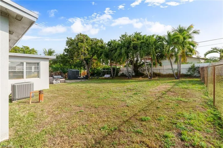 View of fenced backyard