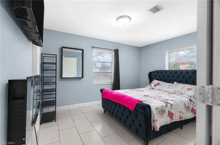Bedroom featuring baseboards
