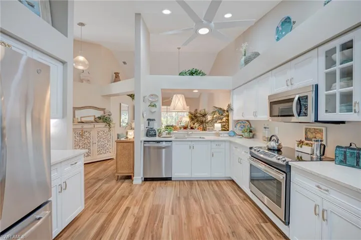 Extended coutertops, newer appliances, redone cabinetry, new tile floors
