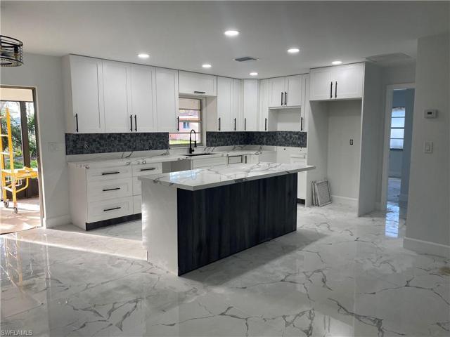 218 Maple AVE S, LEHIGH ACRES FL 33936