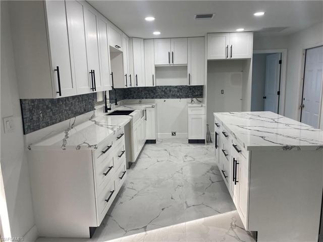 218 Maple AVE S, LEHIGH ACRES FL 33936