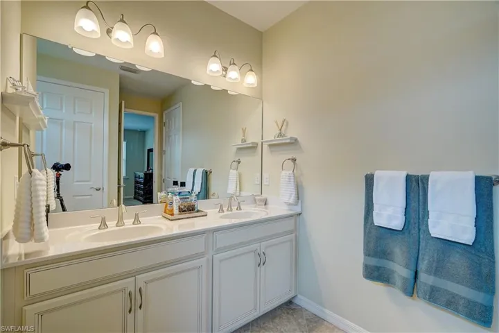 Quartz countertops and great lighting to get ready for your day or night out!