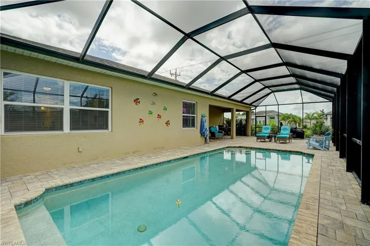 13 x 30 saltwater pool (3' to 5' deep with swim out bench) with extended lanai