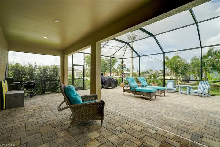 Under truss lanai is approximately 27' x 10'. The screened area stretches the length of the home.