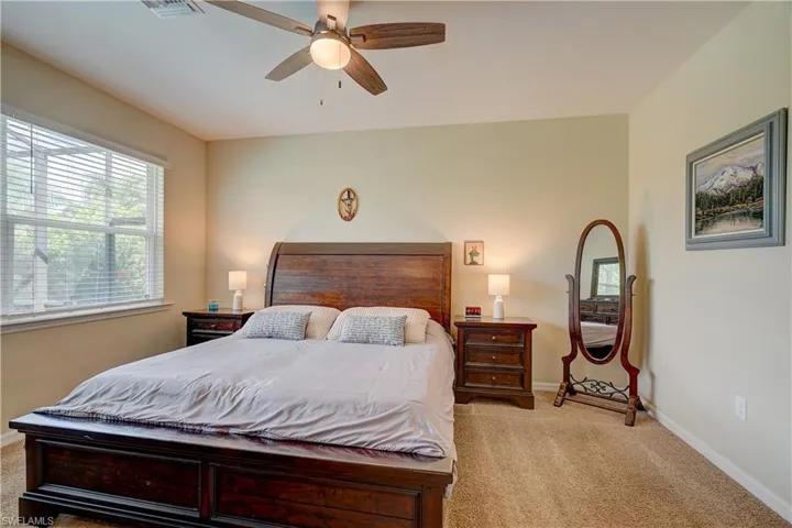 Owner's bedroom overlooking the pool with tons of natural light easily fits king size bed and all the usual furniture