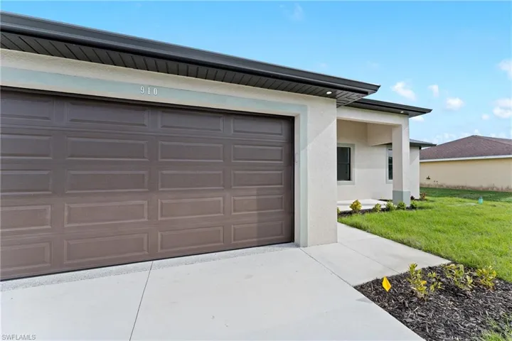 Garage with a lawn